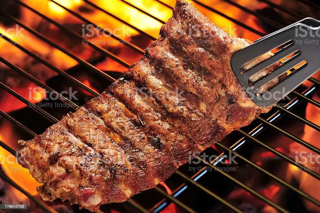 Closeup Of Pork Ribs Over A Charcoal Grill Stock Photo ...