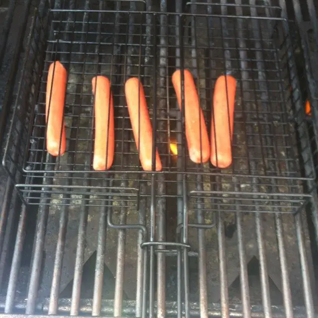 Easy way to grill hot dogs without them burning. Easy on and easy off ...