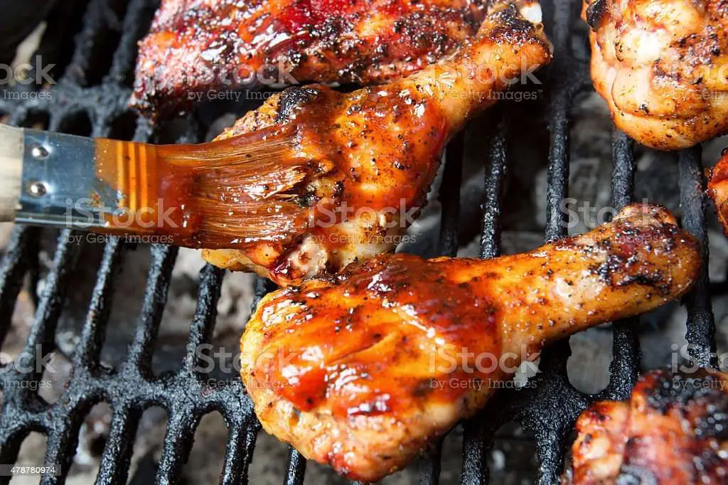 Grilled Chicken Legs On A Charcoal Grill Stock Photo ...