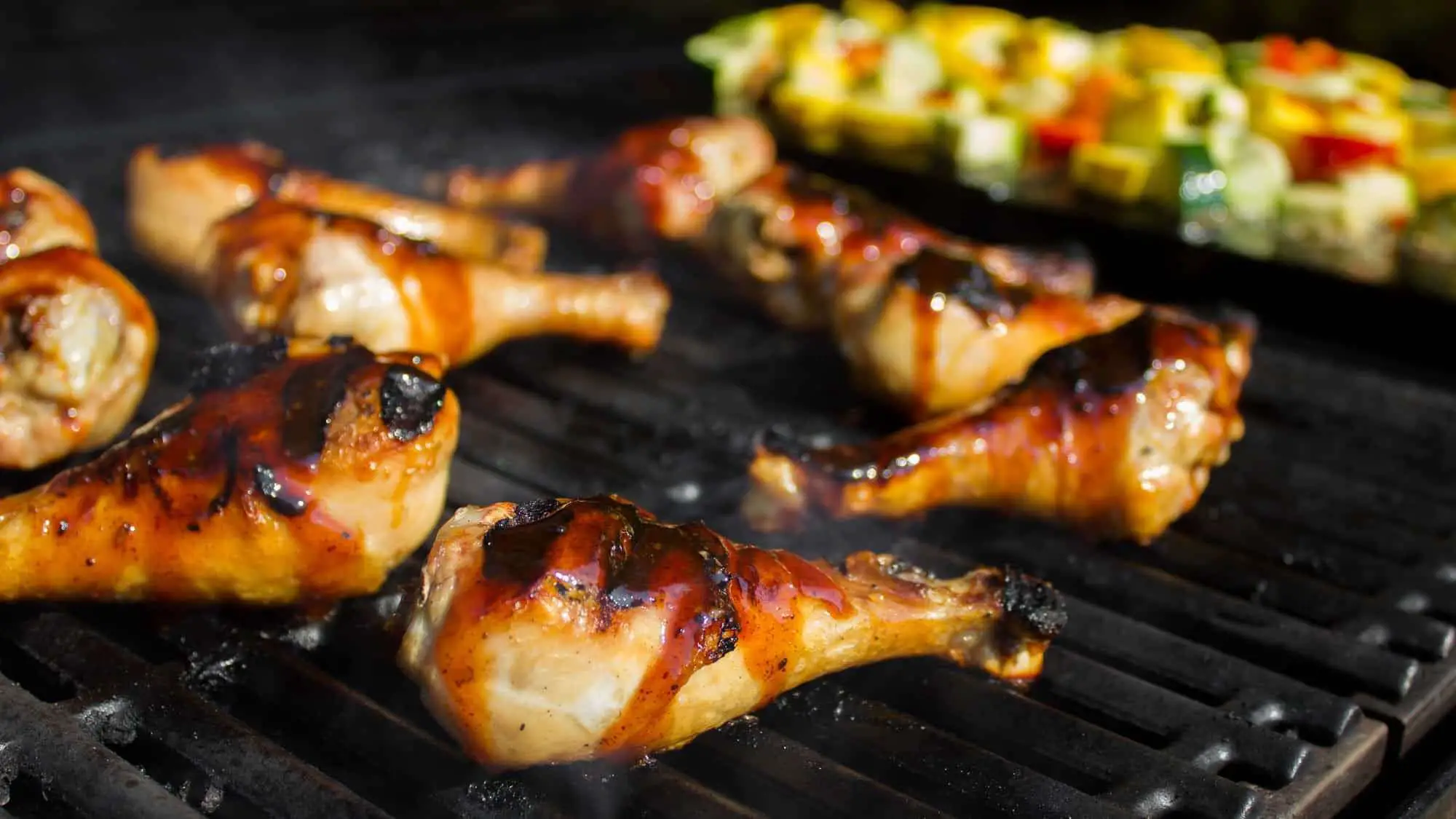 Grilled properly, chicken drumsticks are delicious and tender, with ...