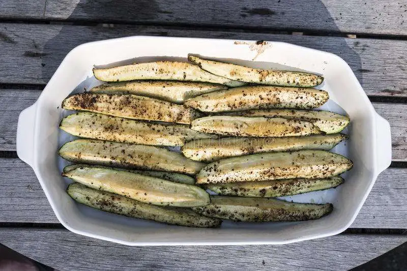 Grilled Zucchini Spears From Barbecue In Serving Dish On ...