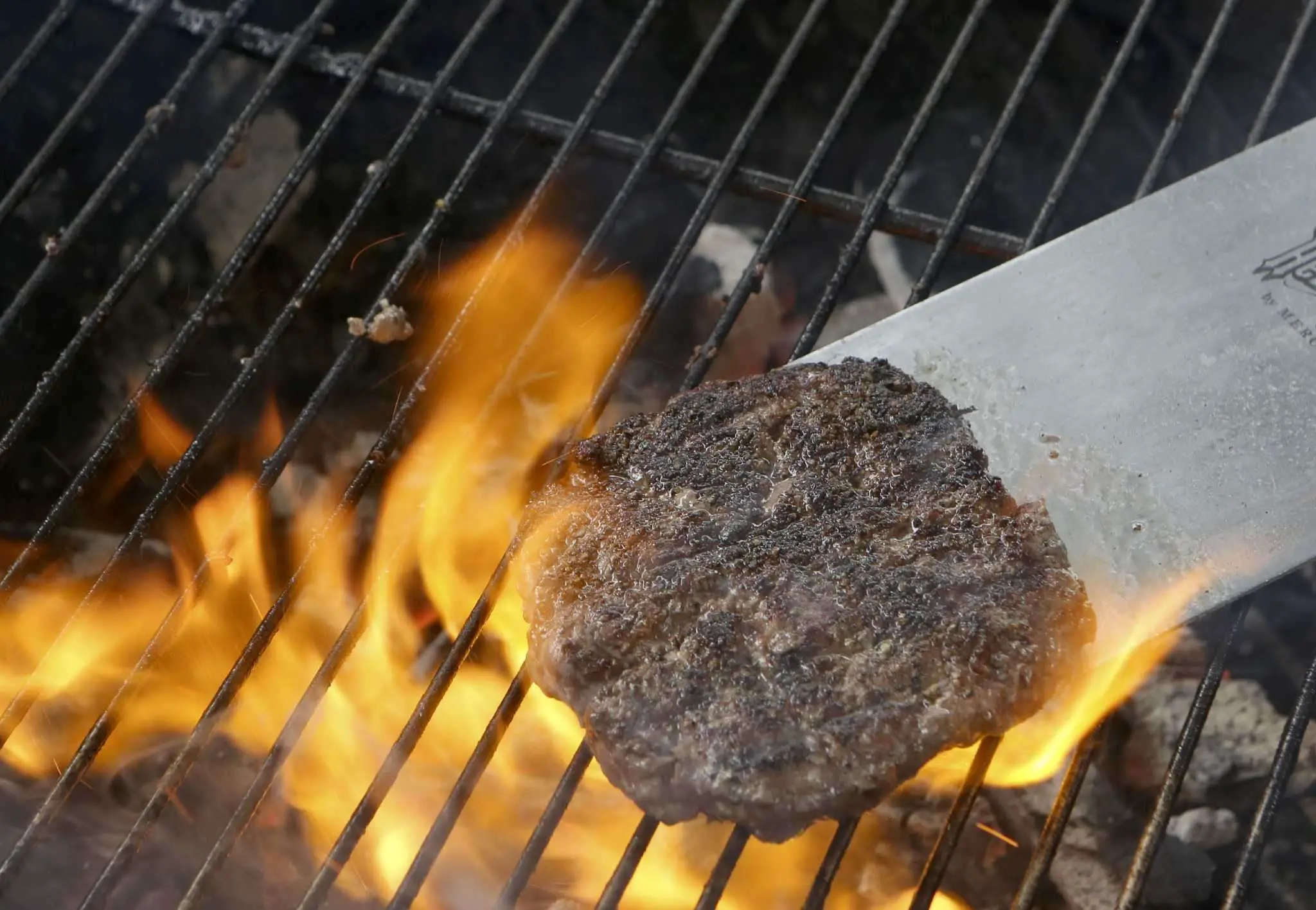 How to Cook: Cooking burgers on a charcoal grill