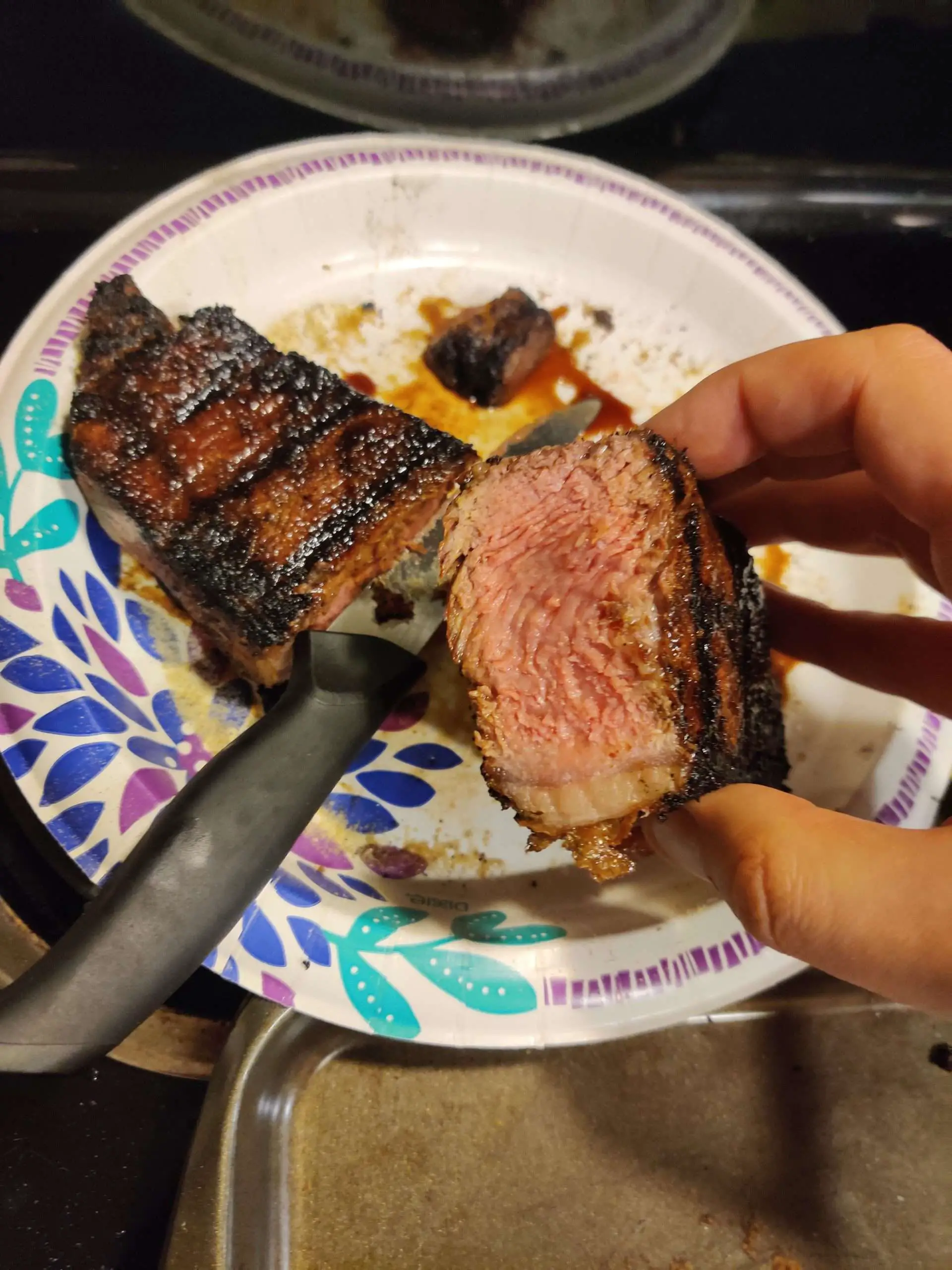 Medium Rare Prime New York Strip Steak on a charcoal grill ...